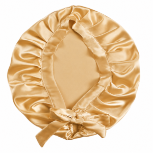 Gold satin hair bonnet with gathered sides and a tied bow at the edge, shown against a white background.